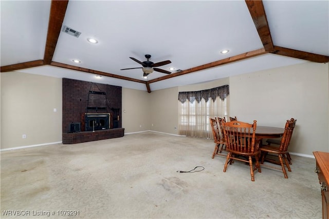 carpeted living area featuring vaulted ceiling with beams, recessed lighting, visible vents, and baseboards