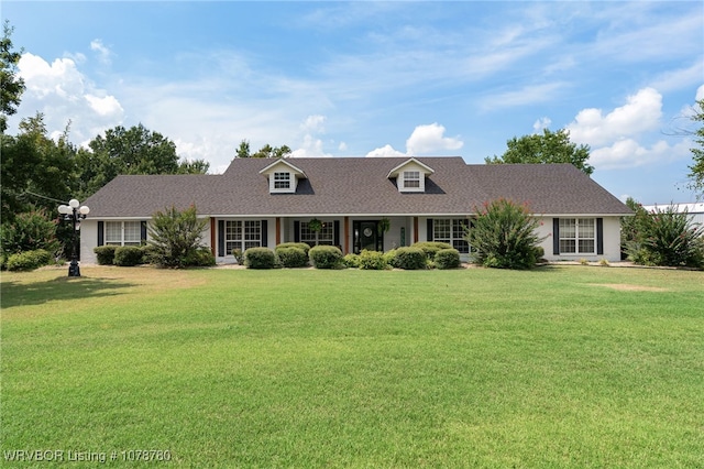 view of front of home with a front lawn