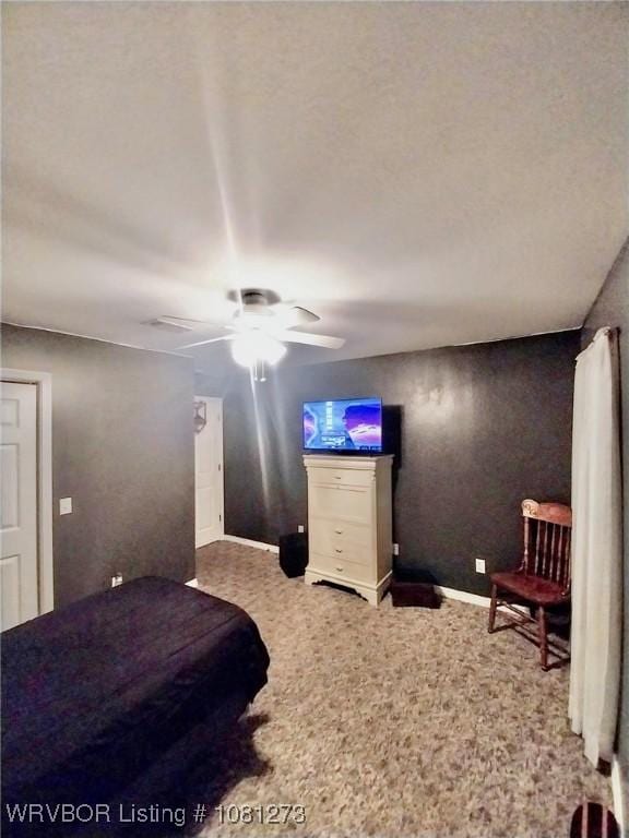 195 Polk 492, Cove, AR 71937 - carpeted bedroom featuring baseboards and a ceiling fan