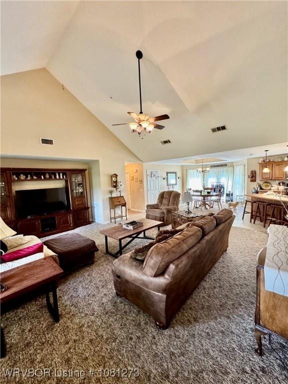 195 Polk 492, Cove, AR 71937 - carpeted living area featuring ceiling fan and high vaulted ceiling