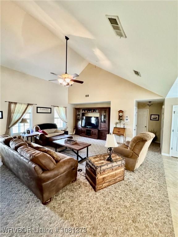 195 Polk 492, Cove, AR 71937 - tiled living room with high vaulted ceiling and ceiling fan