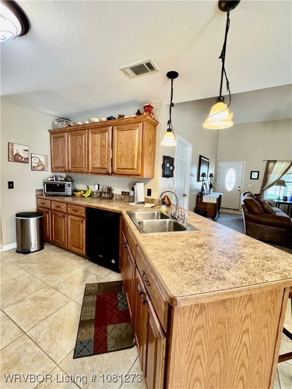 195 Polk 492, Cove, AR 71937 - kitchen featuring a sink, black dishwasher, stainless steel microwave, light countertops, and a peninsula