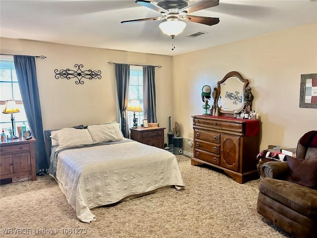 195 Polk 492, Cove, AR 71937 - bedroom with carpet floors, multiple windows, and a ceiling fan