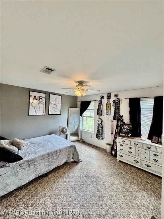 195 Polk 492, Cove, AR 71937 - carpeted bedroom with a ceiling fan