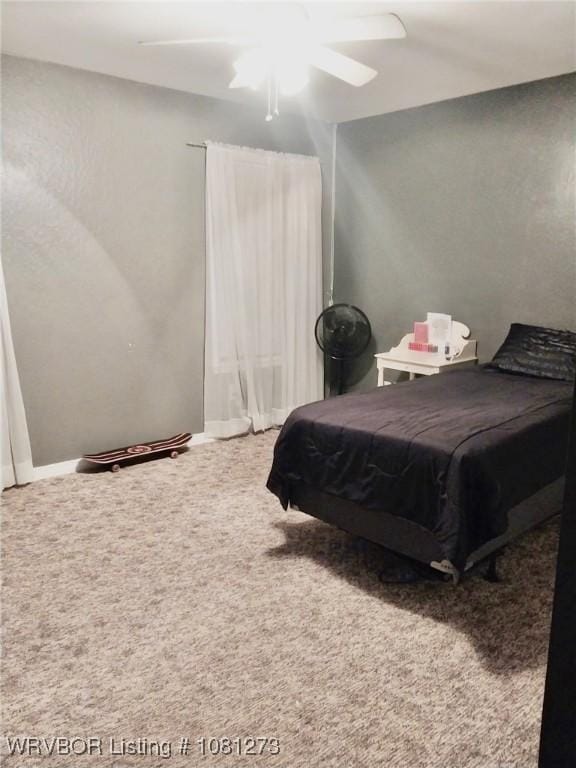 195 Polk 492, Cove, AR 71937 - carpeted bedroom featuring ceiling fan