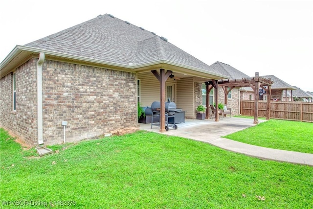 5707 Callaway Ln, Fort Smith, AR 72916 - rear view of house featuring a pergola, a shingled roof, a patio, and brick siding
