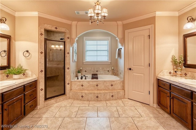 5707 Callaway Ln, Fort Smith, AR 72916 - bathroom with a stall shower, crown molding, two vanities, a garden tub, and a chandelier