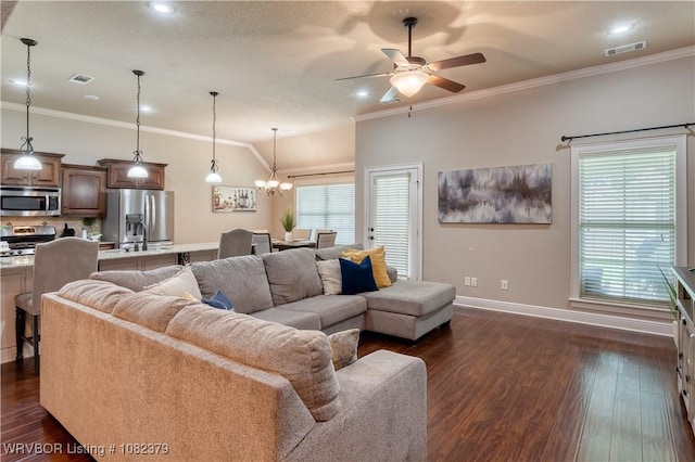 5707 Callaway Ln, Fort Smith, AR 72916 - living area featuring a ceiling fan, crown molding, dark wood finished floors, a chandelier, and recessed lighting