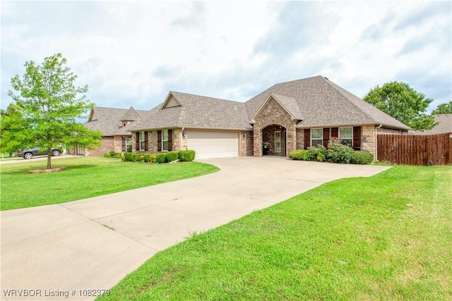 5707 Callaway Ln, Fort Smith, AR 72916 - view of front of property with an attached garage, stone siding, roof with shingles, concrete driveway, and brick siding