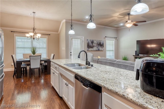 5707 Callaway Ln, Fort Smith, AR 72916 - kitchen with stainless steel appliances, a chandelier, dark wood-style flooring, light stone counters, and open floor plan