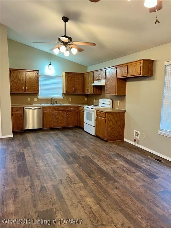 1709 Z St, Fort Smith, AR 72901 - kitchen featuring electric range, dishwasher, lofted ceiling, brown cabinetry, and under cabinet range hood