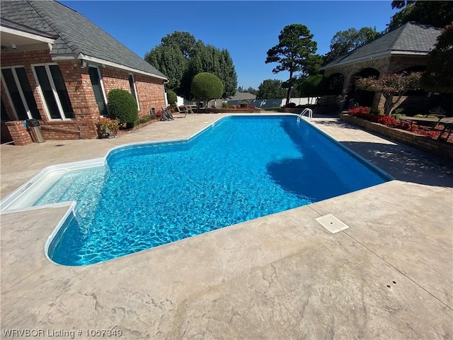 view of pool with a gazebo and a patio