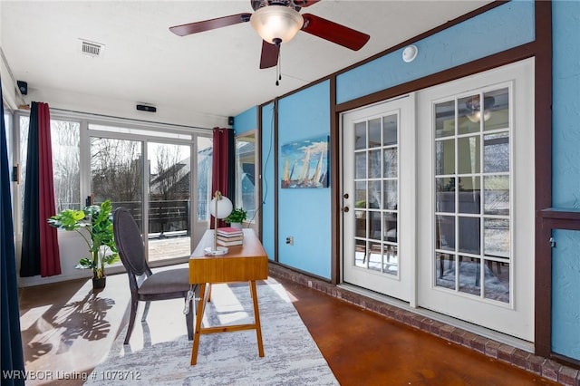 office space with ceiling fan