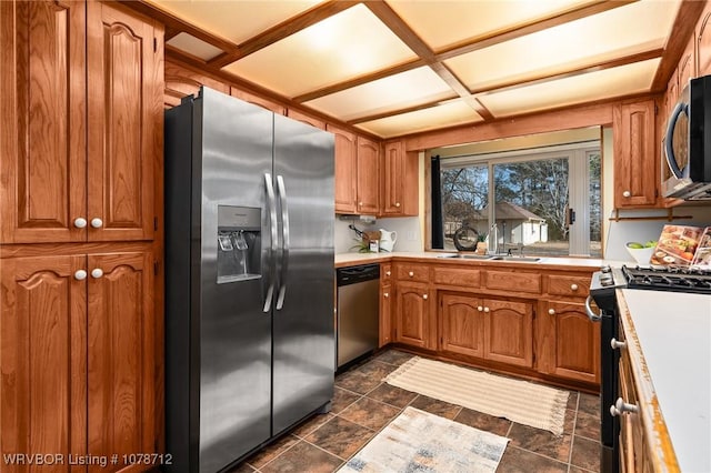 kitchen with appliances with stainless steel finishes and sink