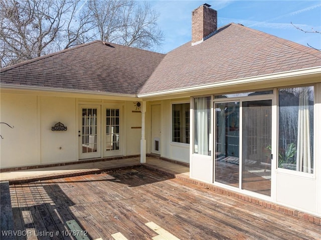 wooden deck featuring french doors