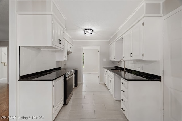 8901 Royal Ridge Dr, Fort Smith, AR 72903 - kitchen with a sink, dark countertops, ornamental molding, white cabinets, and backsplash