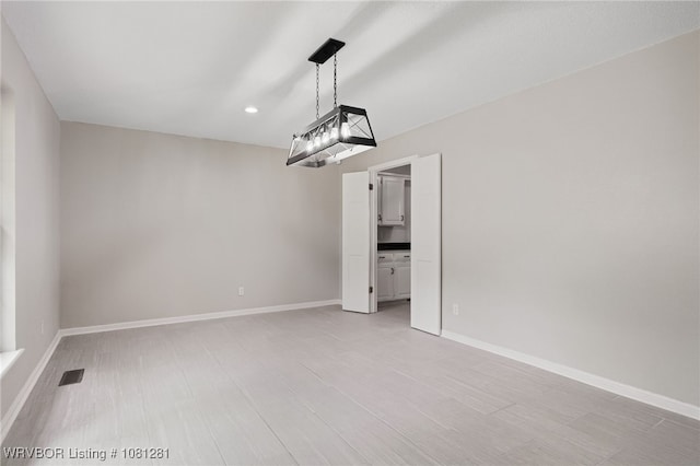 8901 Royal Ridge Dr, Fort Smith, AR 72903 - empty room featuring recessed lighting, light wood-type flooring, and baseboards