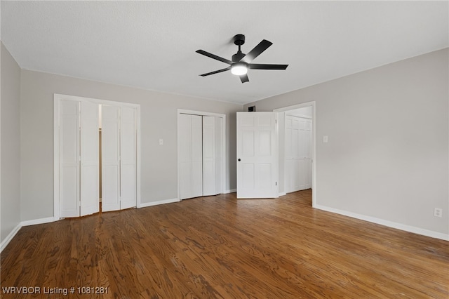 8901 Royal Ridge Dr, Fort Smith, AR 72903 - unfurnished bedroom featuring baseboards, wood finished floors, and ceiling fan
