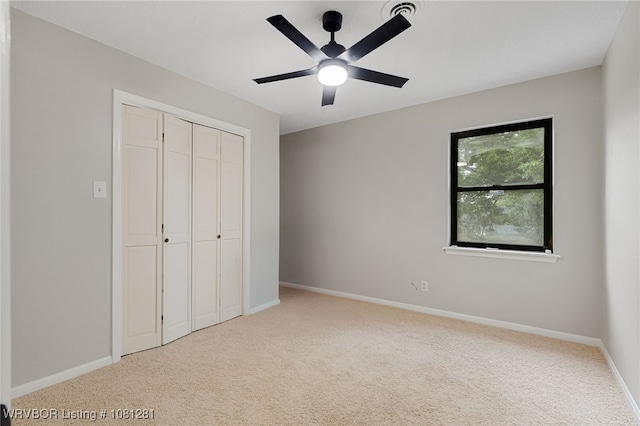 8901 Royal Ridge Dr, Fort Smith, AR 72903 - unfurnished bedroom featuring carpet floors, baseboards, a closet, and a ceiling fan