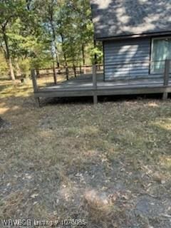 view of yard featuring a wooden deck