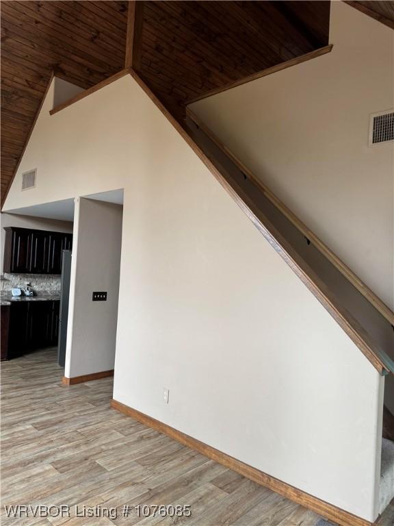 185 Susie Ln, Mena, AR 71953 - interior space with light hardwood / wood-style floors, wood ceiling, and high vaulted ceiling