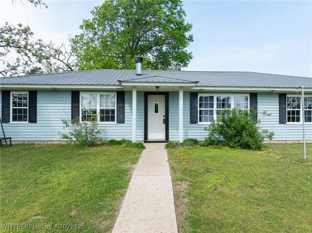 255 Spielerville Rd, Paris, AR 72855 - view of front of house featuring a front lawn and metal roof