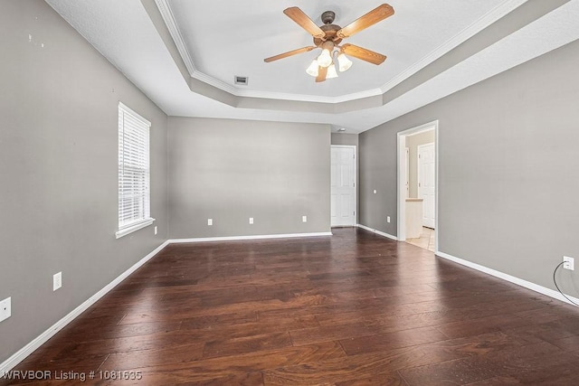 1129 Arapahoe Dr, Van Buren, AR 72956 - unfurnished room with a raised ceiling, ceiling fan, ornamental molding, and hardwood / wood-style flooring