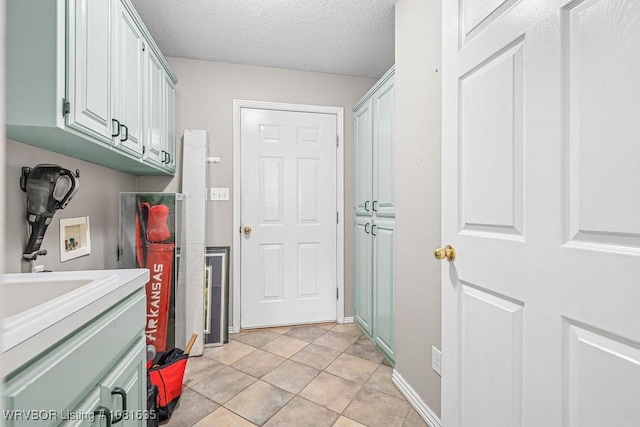 1129 Arapahoe Dr, Van Buren, AR 72956 - washroom featuring hookup for a washing machine and a textured ceiling
