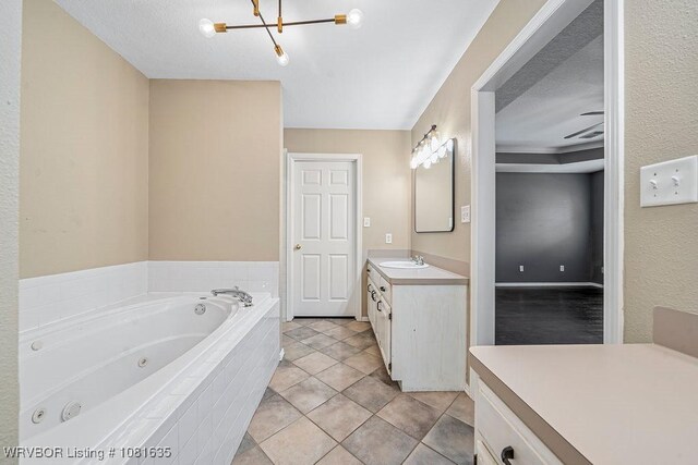 1129 Arapahoe Dr, Van Buren, AR 72956 - full bath with vanity, a jetted tub, a chandelier, and tile patterned floors
