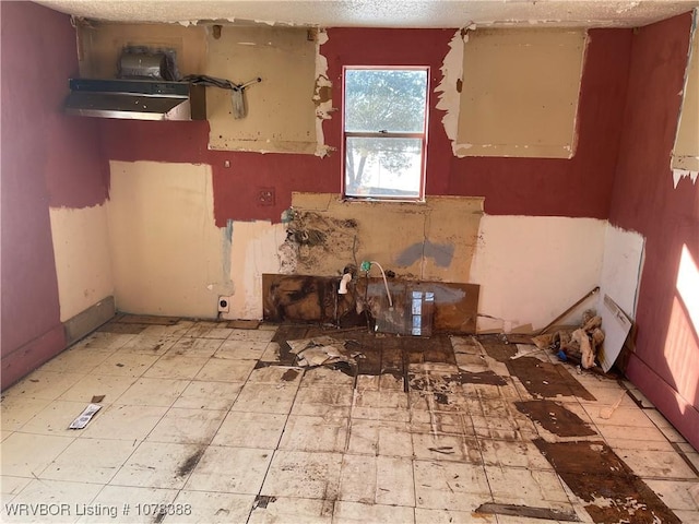 kitchen with a textured ceiling