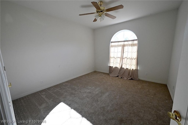 carpeted empty room with ceiling fan