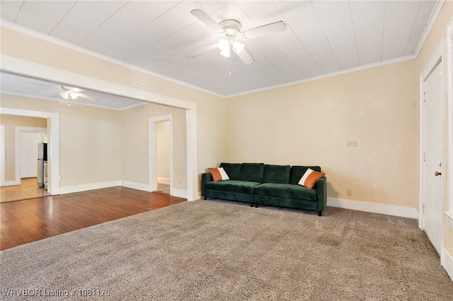 618 N 21st St, Fort Smith, AR 72901 - sitting room with a ceiling fan, carpet, crown molding, baseboards, and wood finished floors