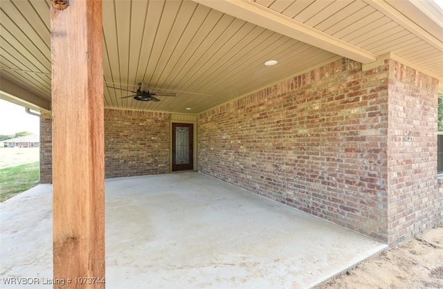 view of patio featuring ceiling fan