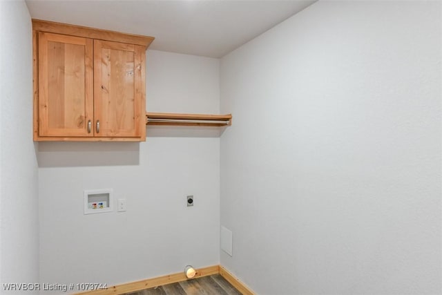 laundry area featuring washer hookup, electric dryer hookup, cabinets, and wood-type flooring