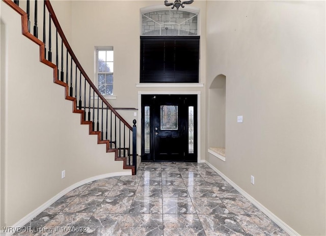 entrance foyer with a high ceiling