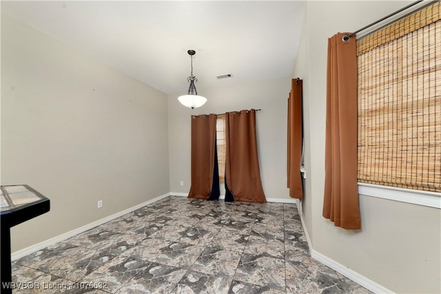 view of unfurnished dining area