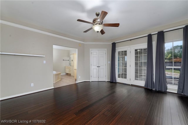 interior space featuring ceiling fan, wood-type flooring, and ornamental molding