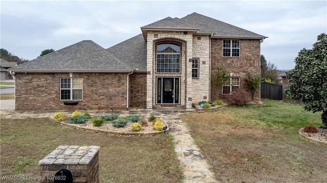 view of front of property with a front lawn