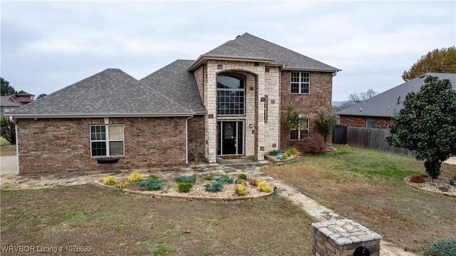 view of front facade with a front yard