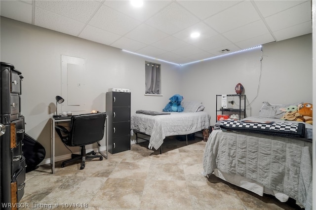 bedroom with a drop ceiling