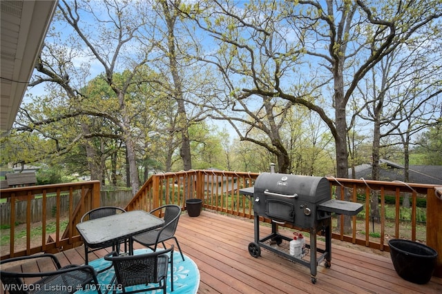 wooden terrace with area for grilling