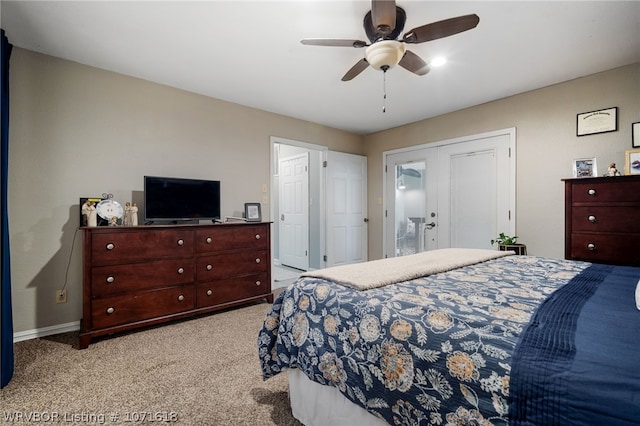 bedroom with light carpet, a closet, and ceiling fan