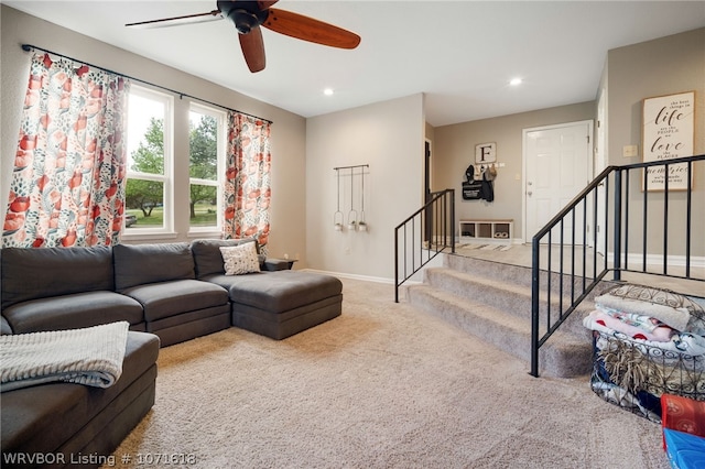 living room with carpet flooring and ceiling fan