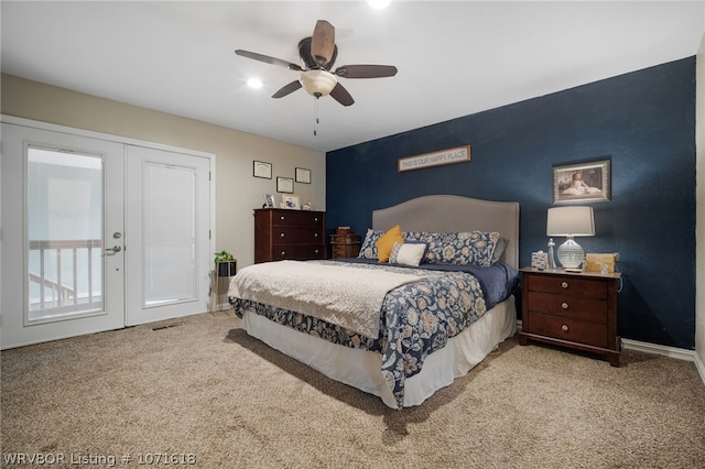 bedroom with light carpet, french doors, and ceiling fan