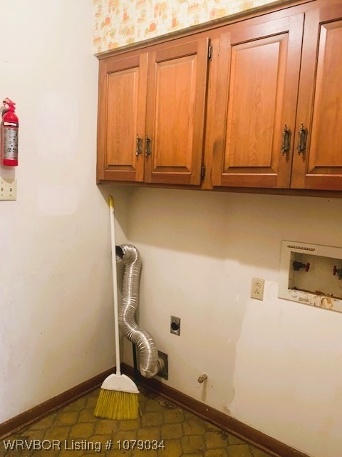 laundry room featuring hookup for a washing machine, hookup for a gas dryer, hookup for an electric dryer, baseboards, and cabinet space