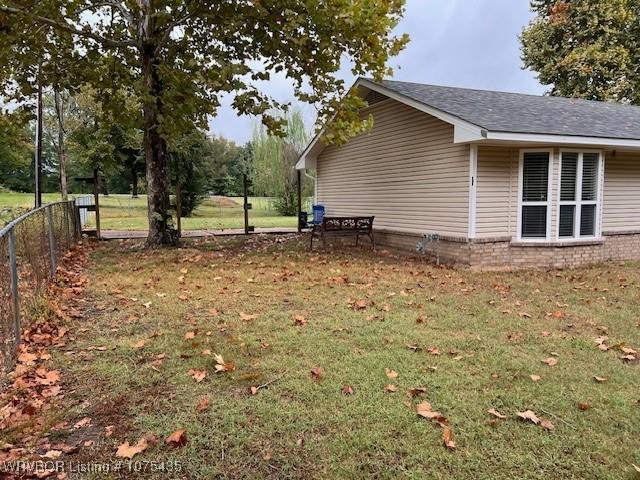 view of home's exterior featuring a lawn