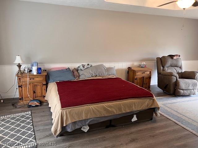 bedroom featuring hardwood / wood-style floors and ceiling fan