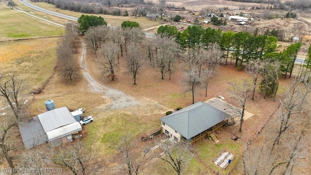 birds eye view of property featuring a rural view