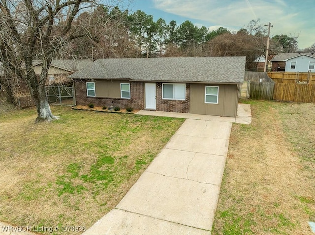 ranch-style home with a front yard