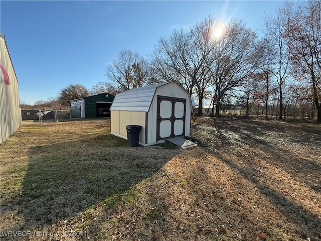 view of outdoor structure with a lawn